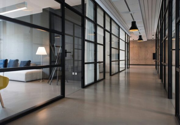 hallway between glass-panel doors