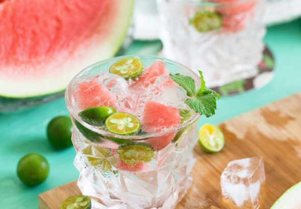 sliced watermelon with lemon on shot glass