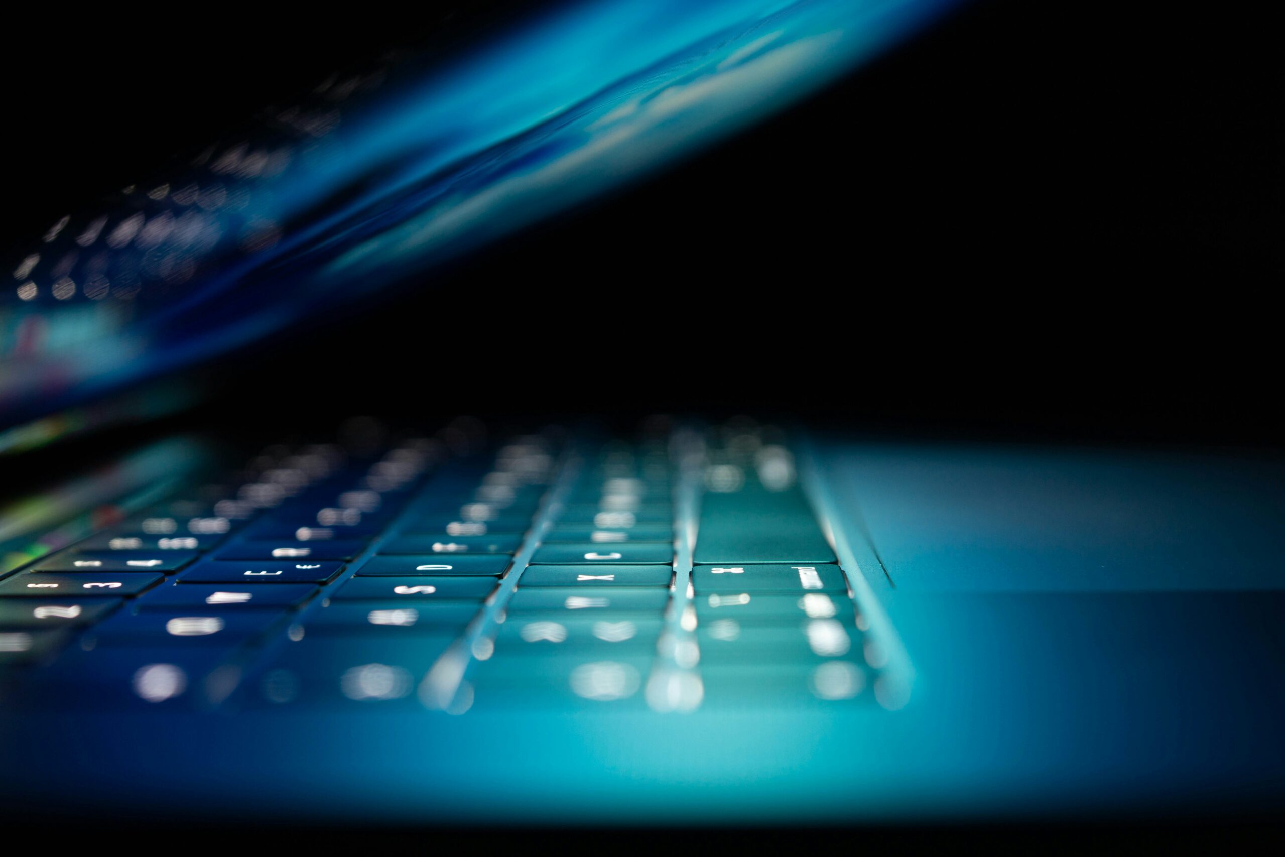 closeup photo of turned-on blue and white laptop computer: Computer Security